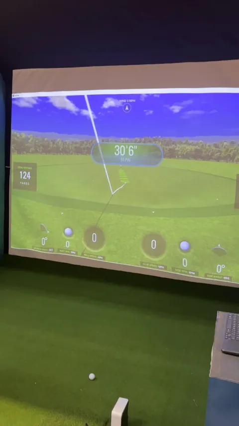 The impact screen showing a SkyTrak driving range view