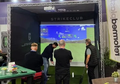 The rig at an event with the Strikeclub name above the screen