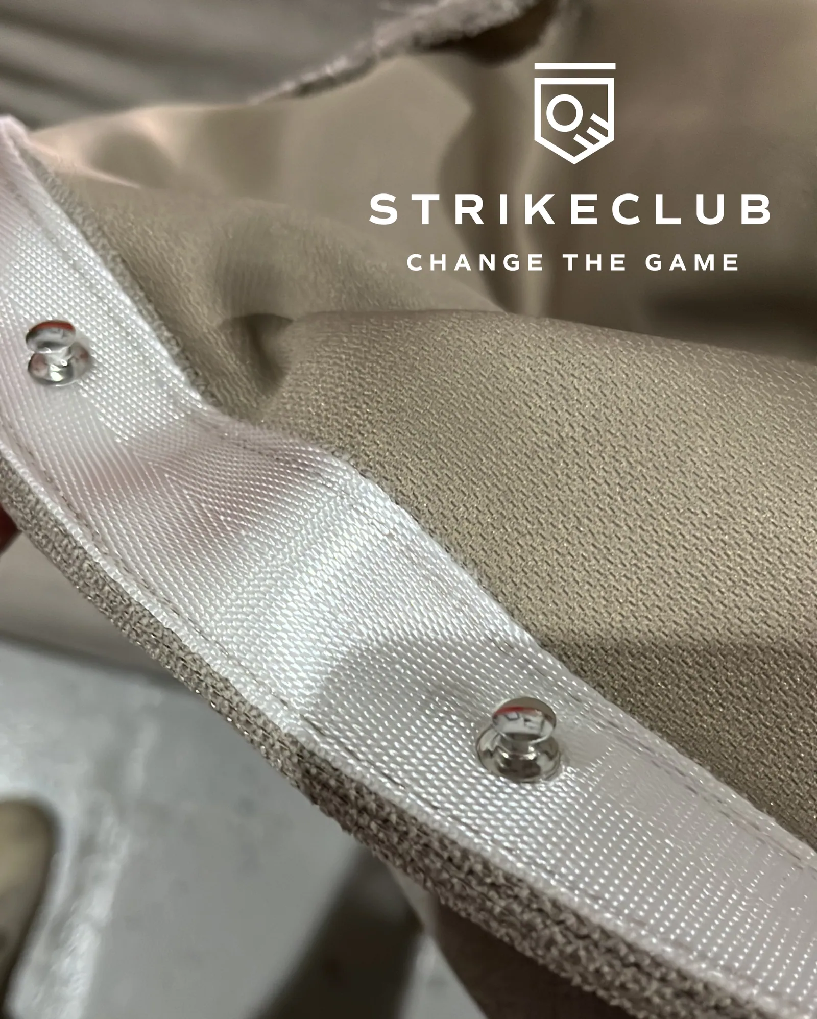A close look at the stitched hem and eyelets on a screen