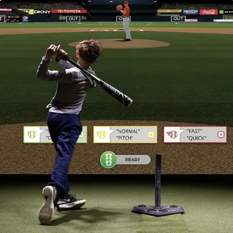 A baseball game projected on the screen