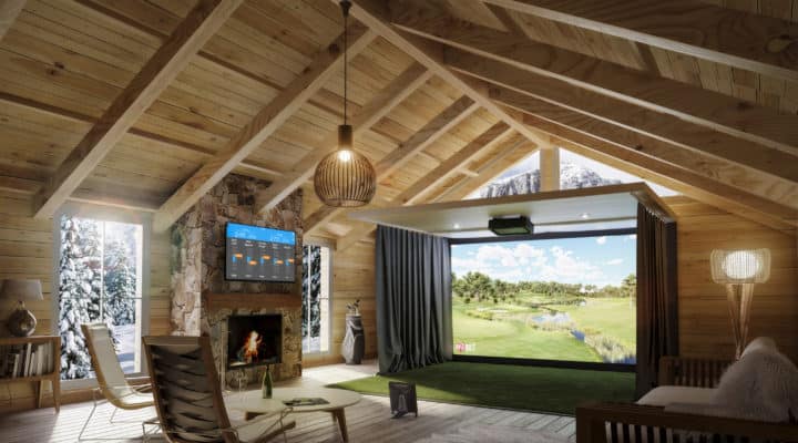TrackMan home golf simulator inside a log cabin